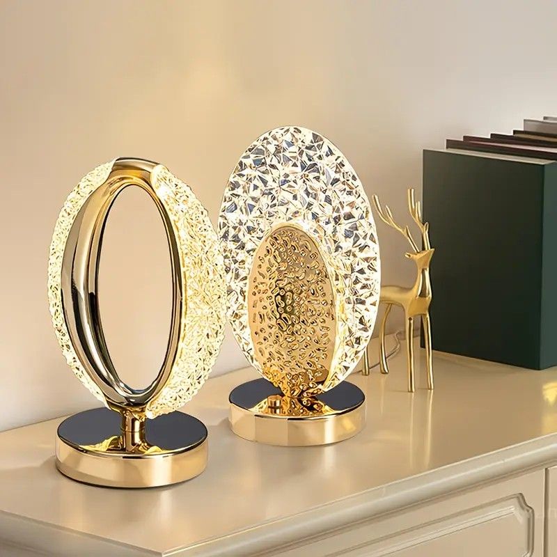 Rechargeable acrylic crystal desk lamp with 3 color temperatures touch control, USB charging for portability, and stepless brightness adjustment. Diamond-cut design serves as both an ambient light and an art piece./Peacock feather
