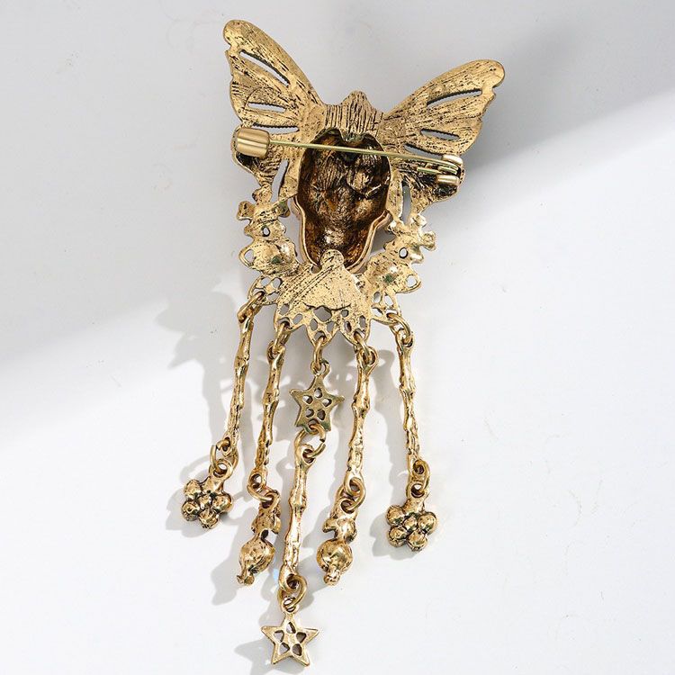 Gothic Skull Butterfly Brooch with Tassel - Vintage Rhinestone Skeleton Pin with Dangling Charms, Dark Aesthetic Statement Badge for Coat Sweater, 11.3cm